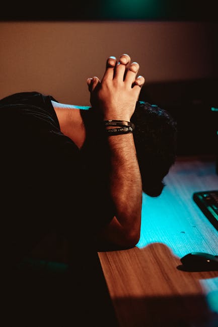 Office worker stretching arms above head